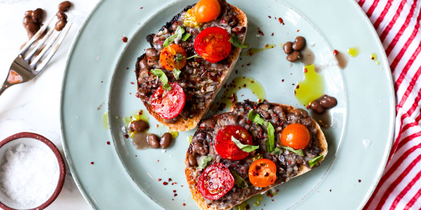 BROWN TEPARY BEAN TOAST WITH CHERRY TOMATOES