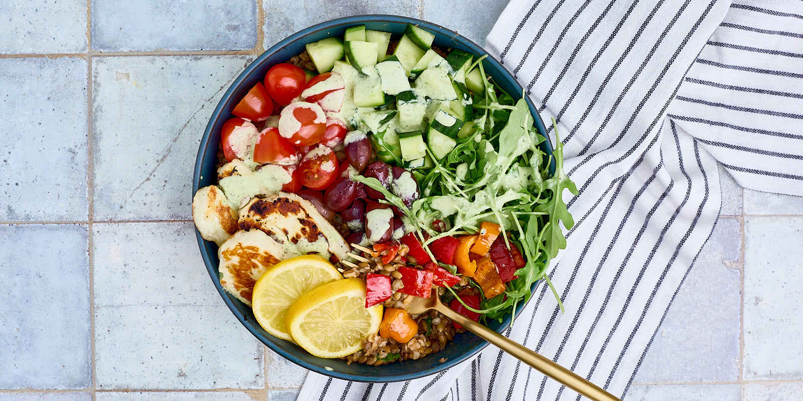 vibrant ancient grain bowl with mediterranean vegetables