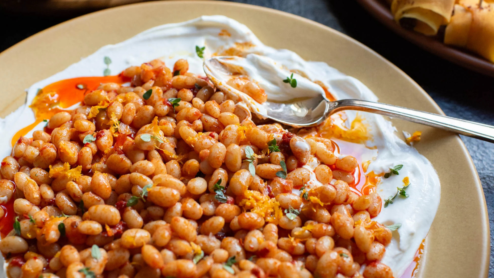Alubia beans with rose harissa and orange