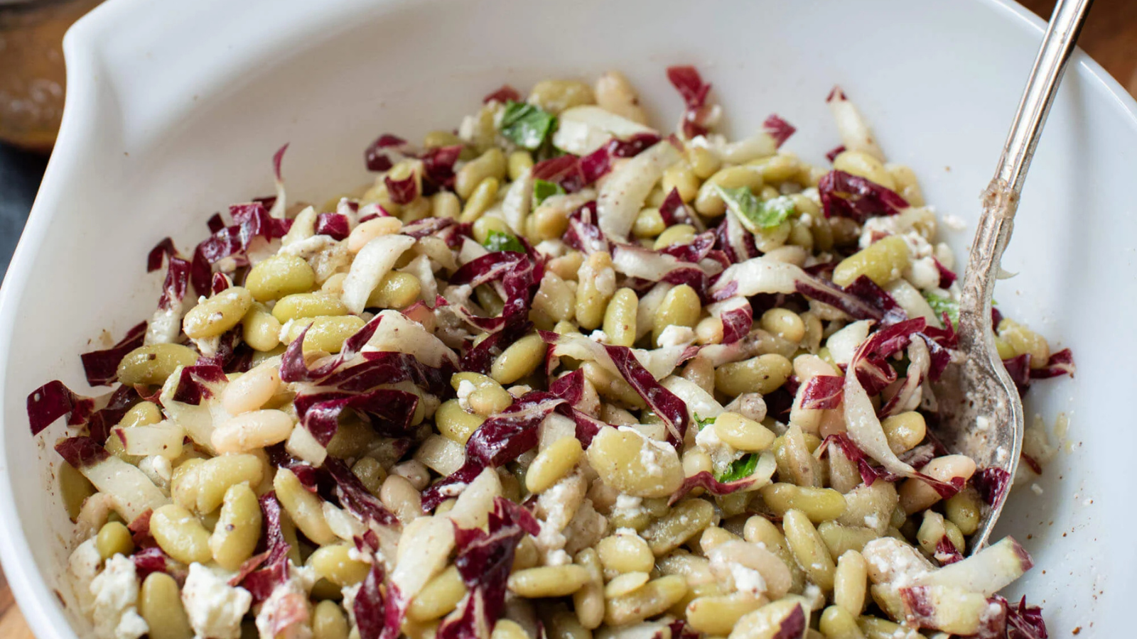 Marinated bean salad with chicory, feta, and mint
