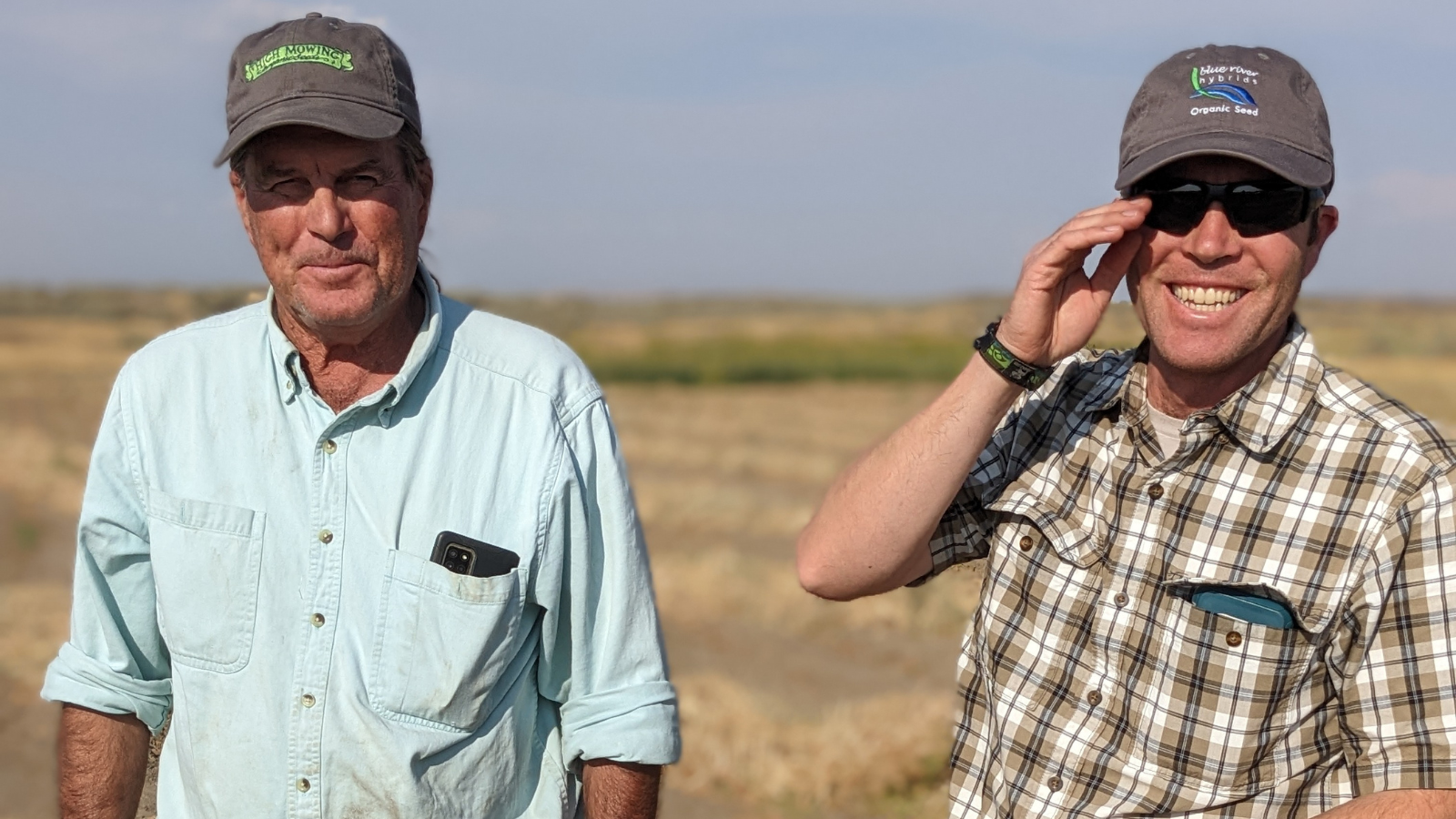 Fred and Cooper Brossy standing in a field