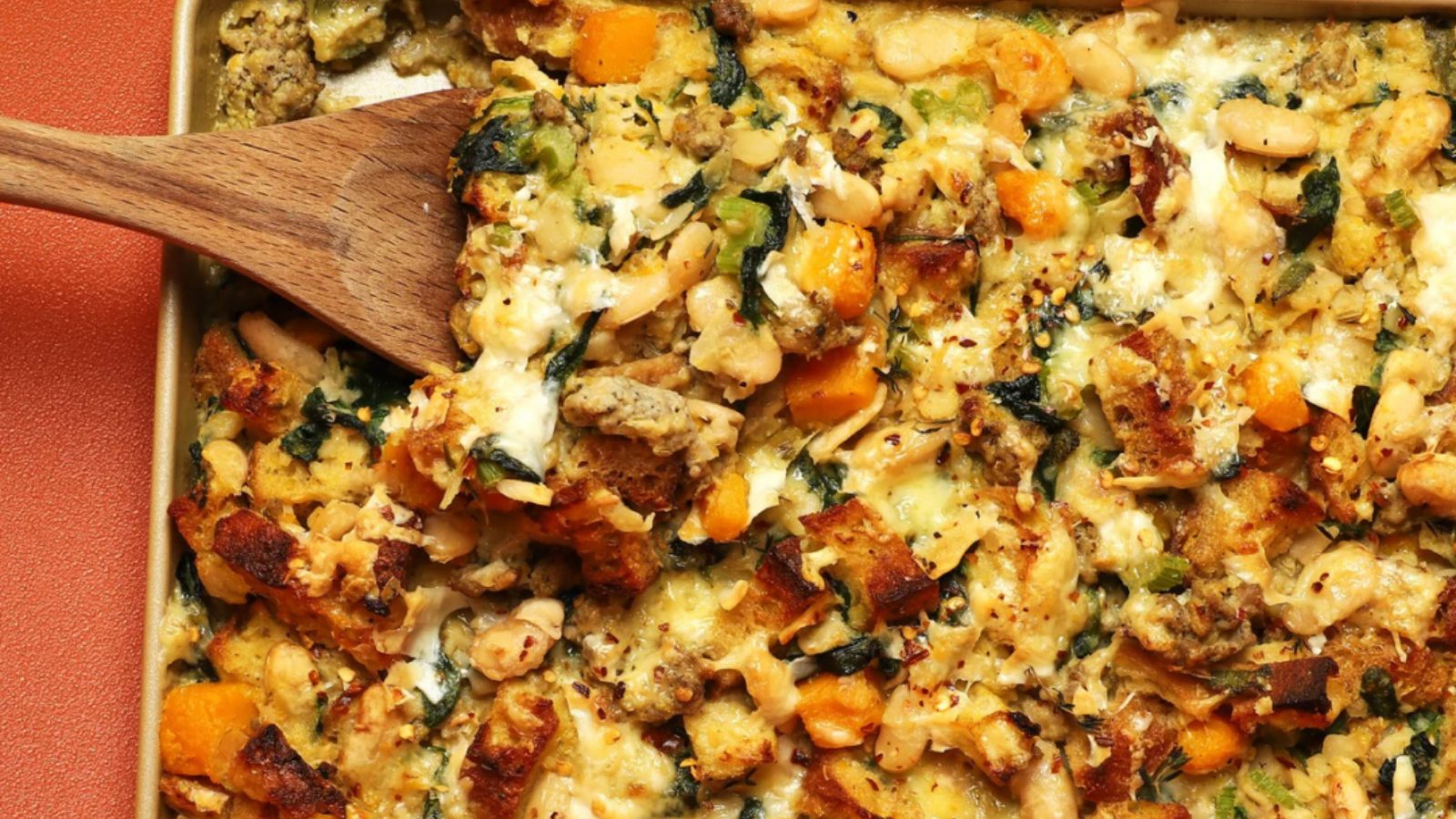 tray of stuffing with chunky vegetables and white beans