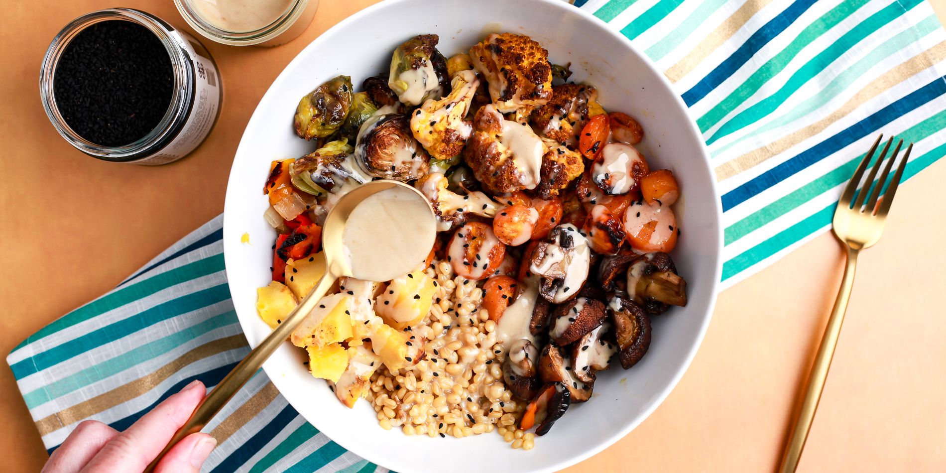 WINTER GRAIN BOWL WITH LEMON TAHINI DRESSING AND NIGELLA