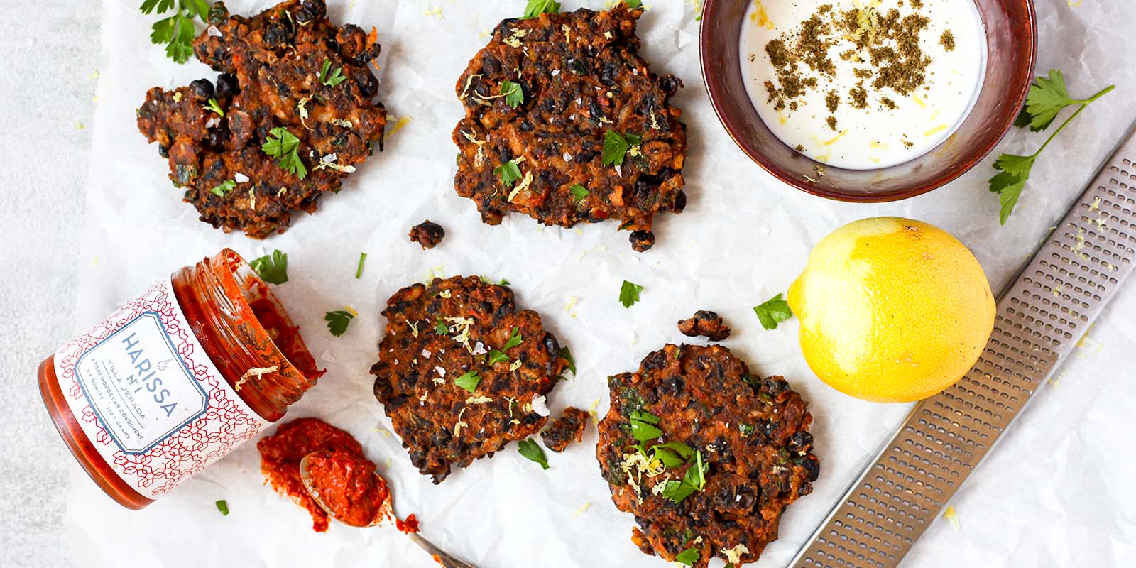 Harissa spiced black chickpea cakes