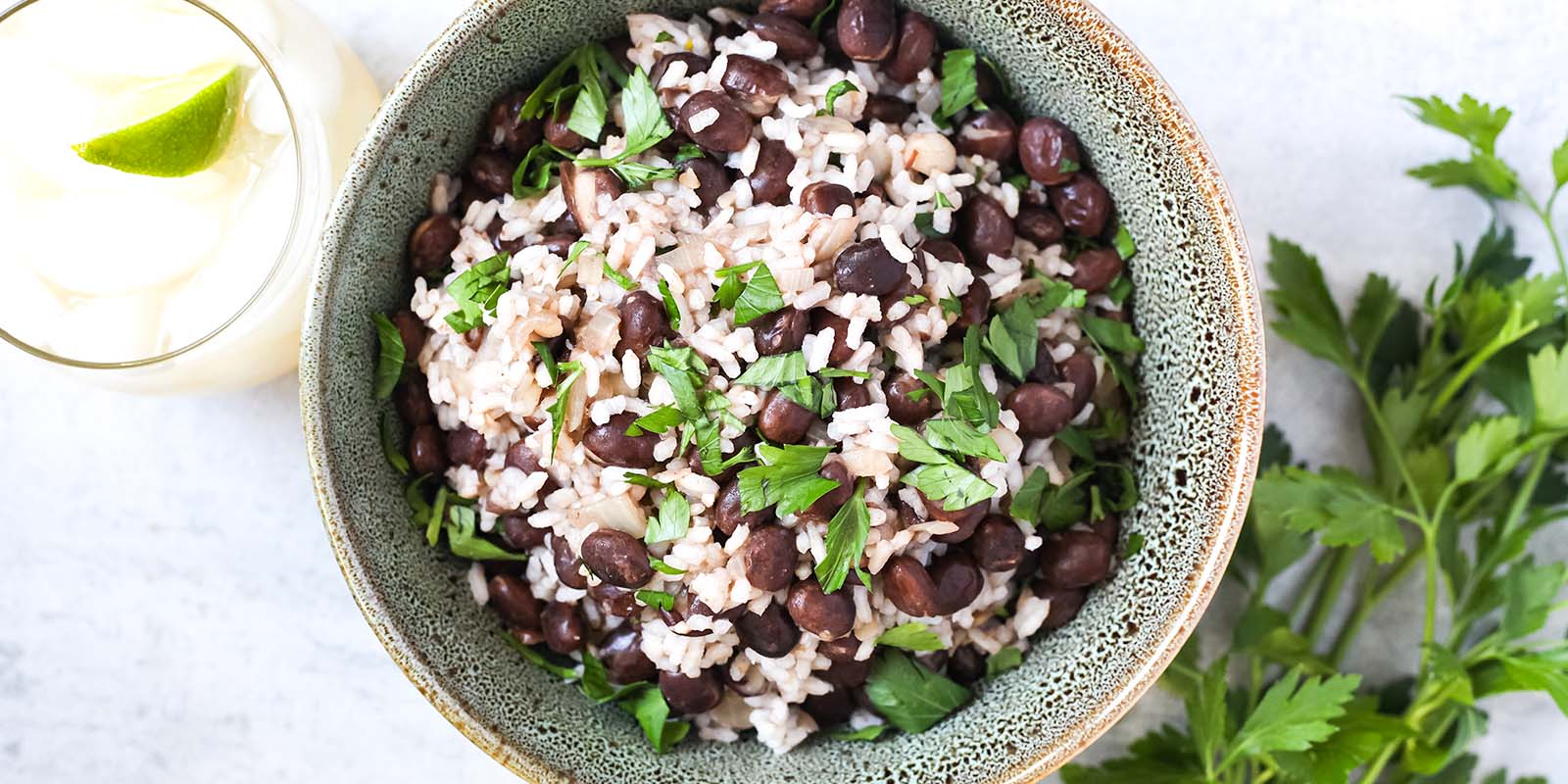 brazilian beans simmered in a rustic clay pot with herbs and spices