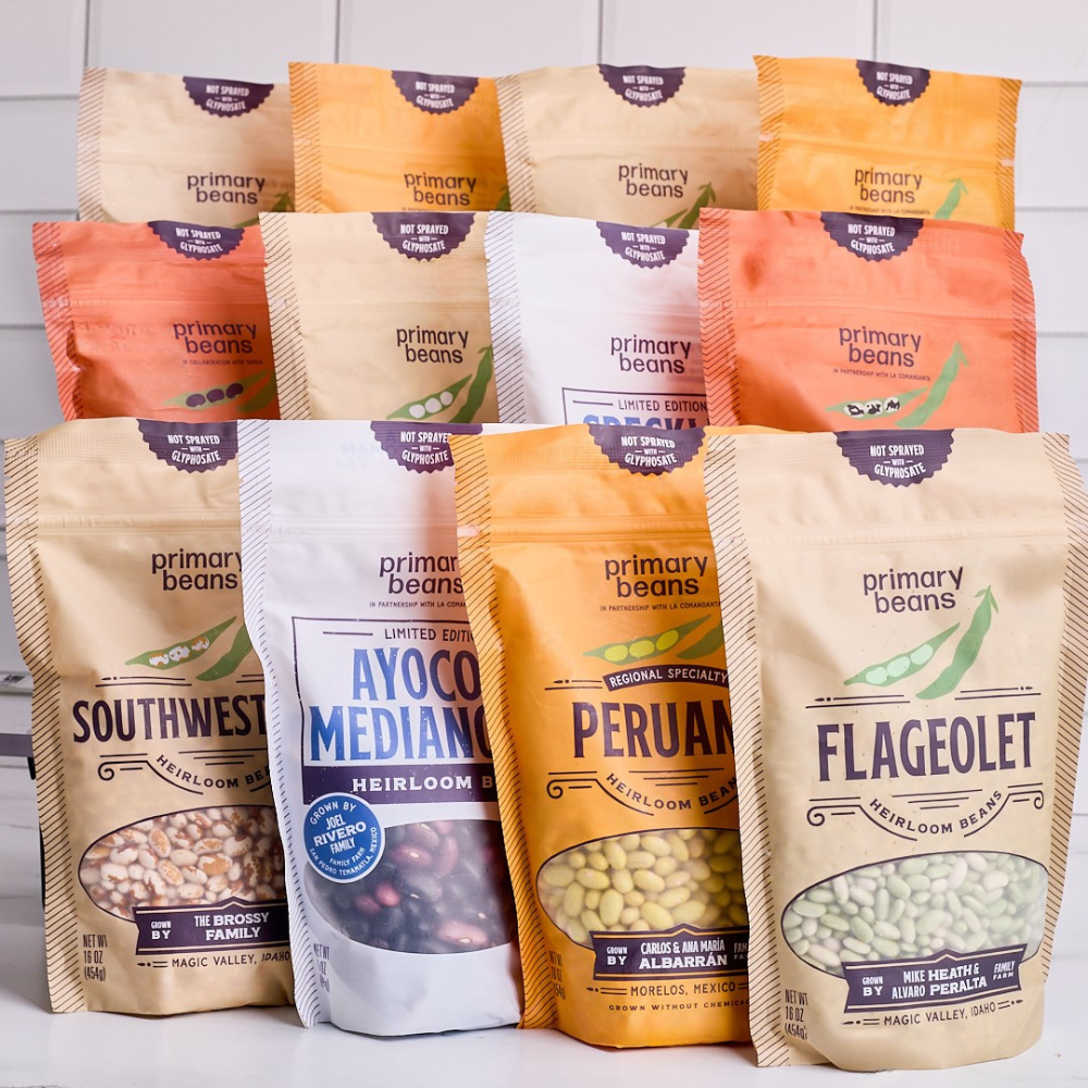 Assorted packages of Primary Beans with different bean types and flavors.