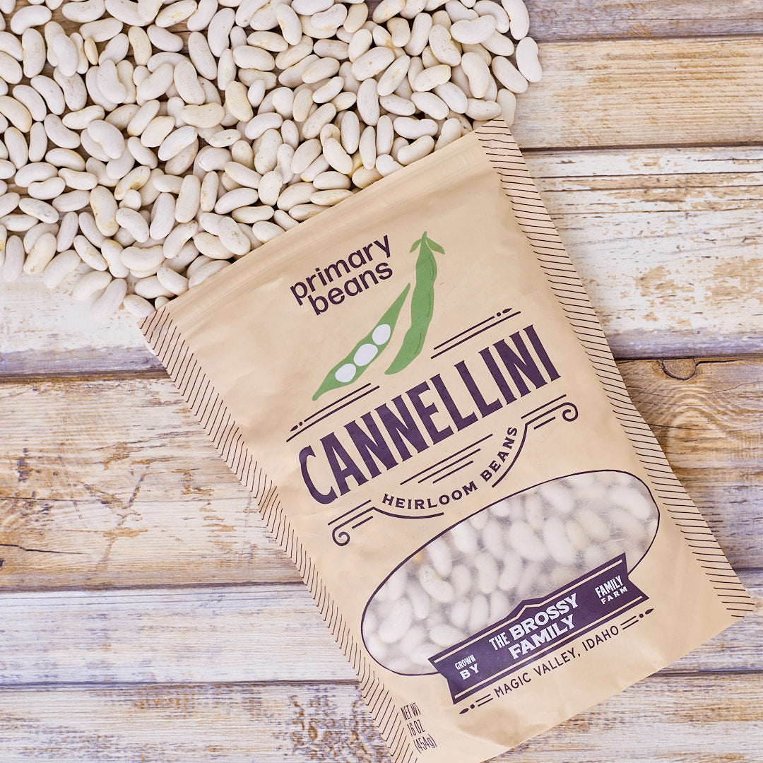 Cannellini beans package with beans on a wooden surface