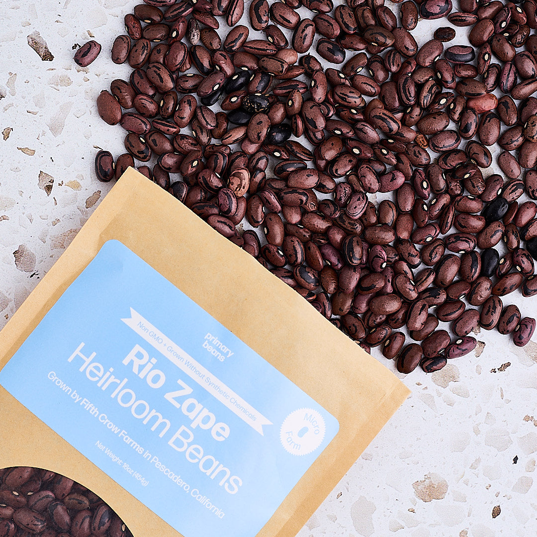 Rio Zape Heirloom Beans with a package on a textured surface